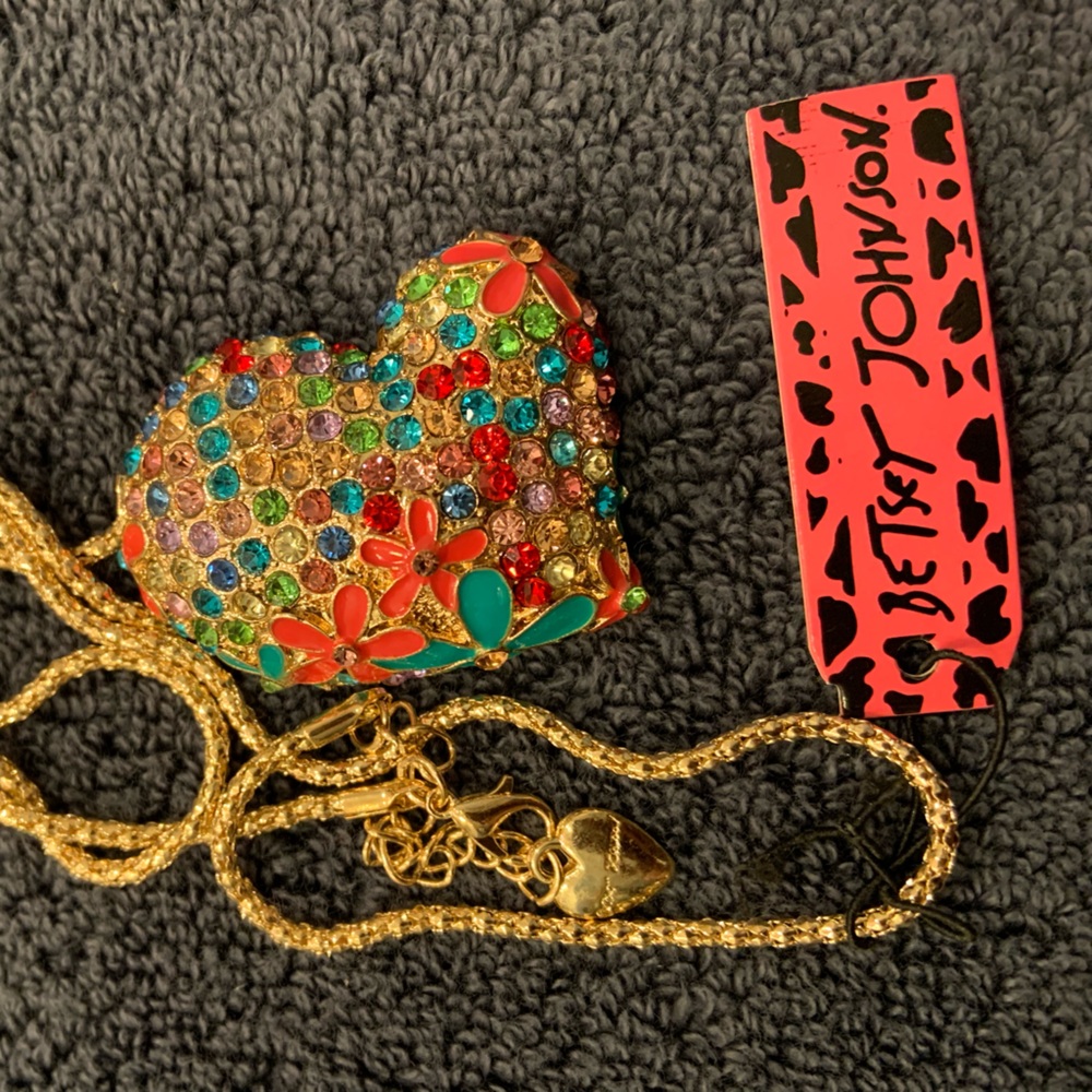 On sale! BJ multi-colored stones, a sweet flower on edge of heart. Drop is 12”.